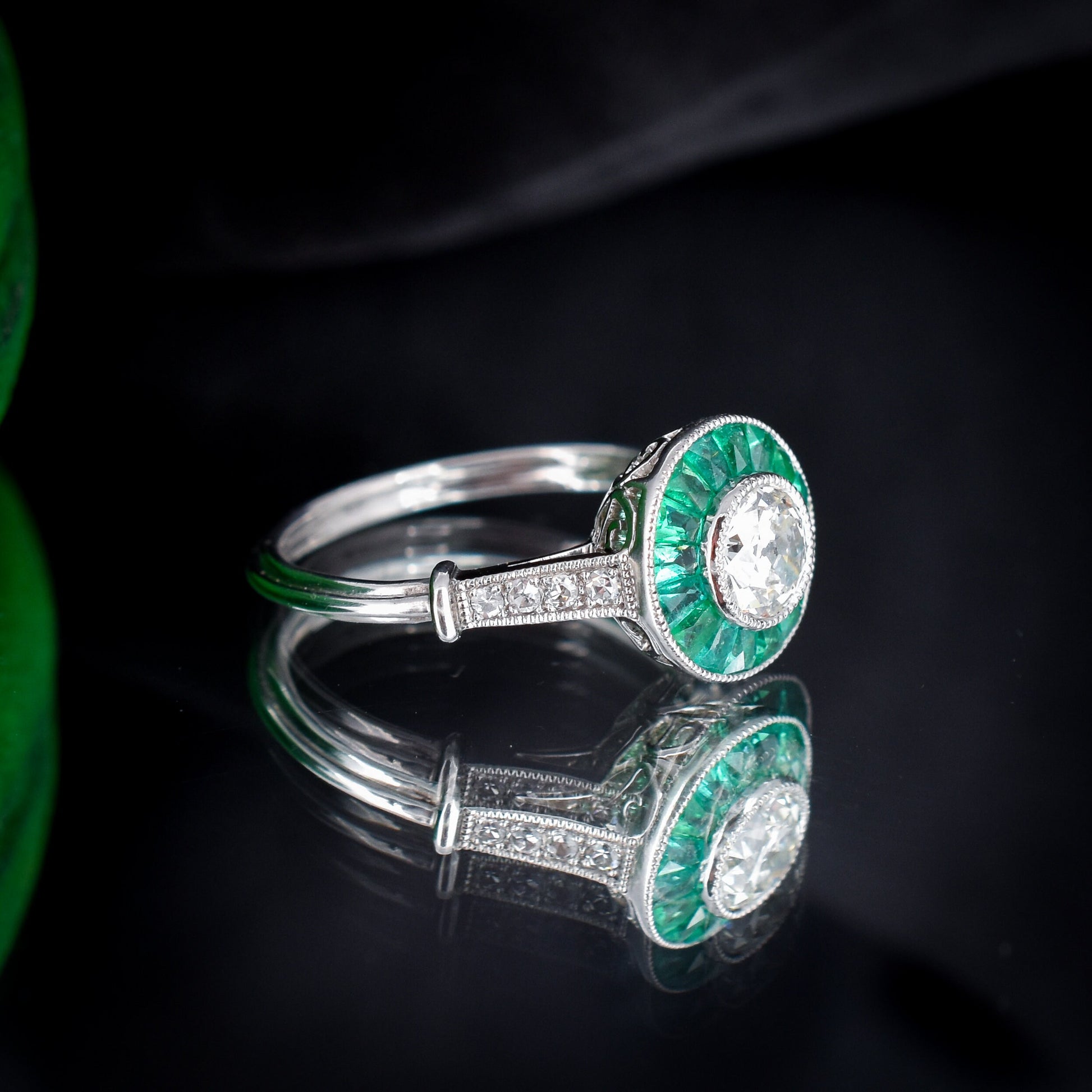 Art Deco Style Emerald and Old Cut Diamond Target Cluster Halo Platinum Ring