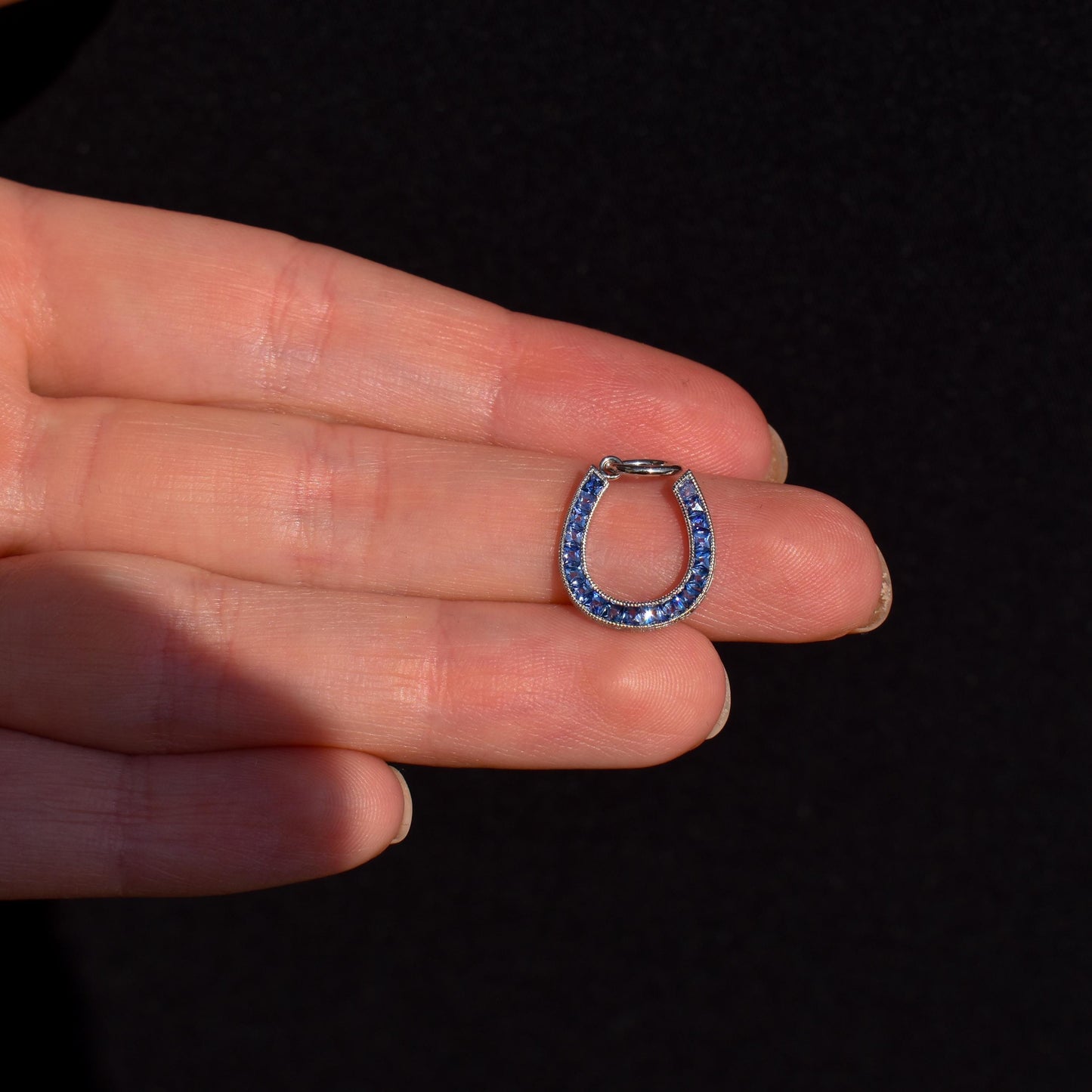French Cut Blue Sapphire Horseshoe Platinum Charm Pendant - 0.55ct