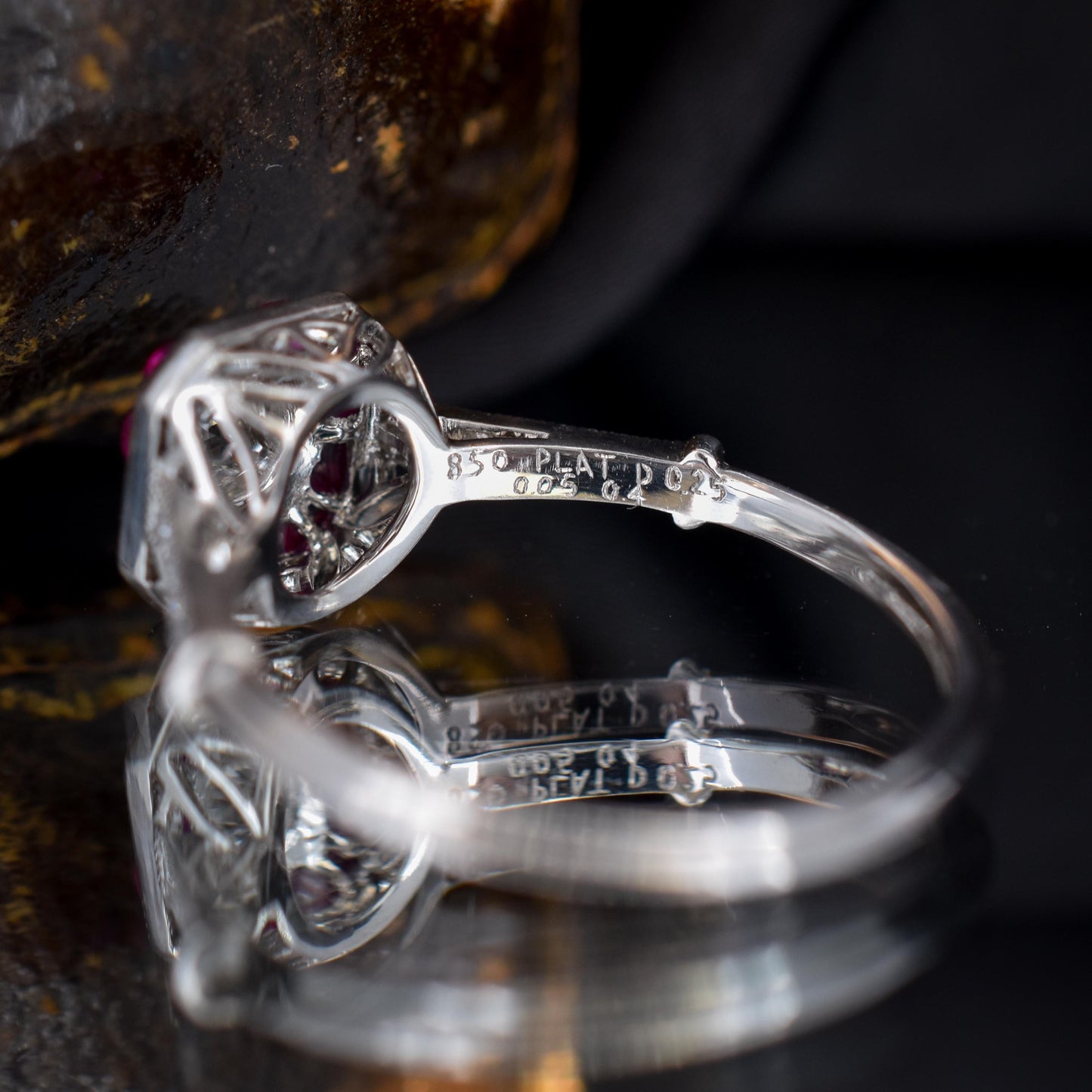 Art Deco Style Ruby and Old Cut Diamond Halo Platinum Ring