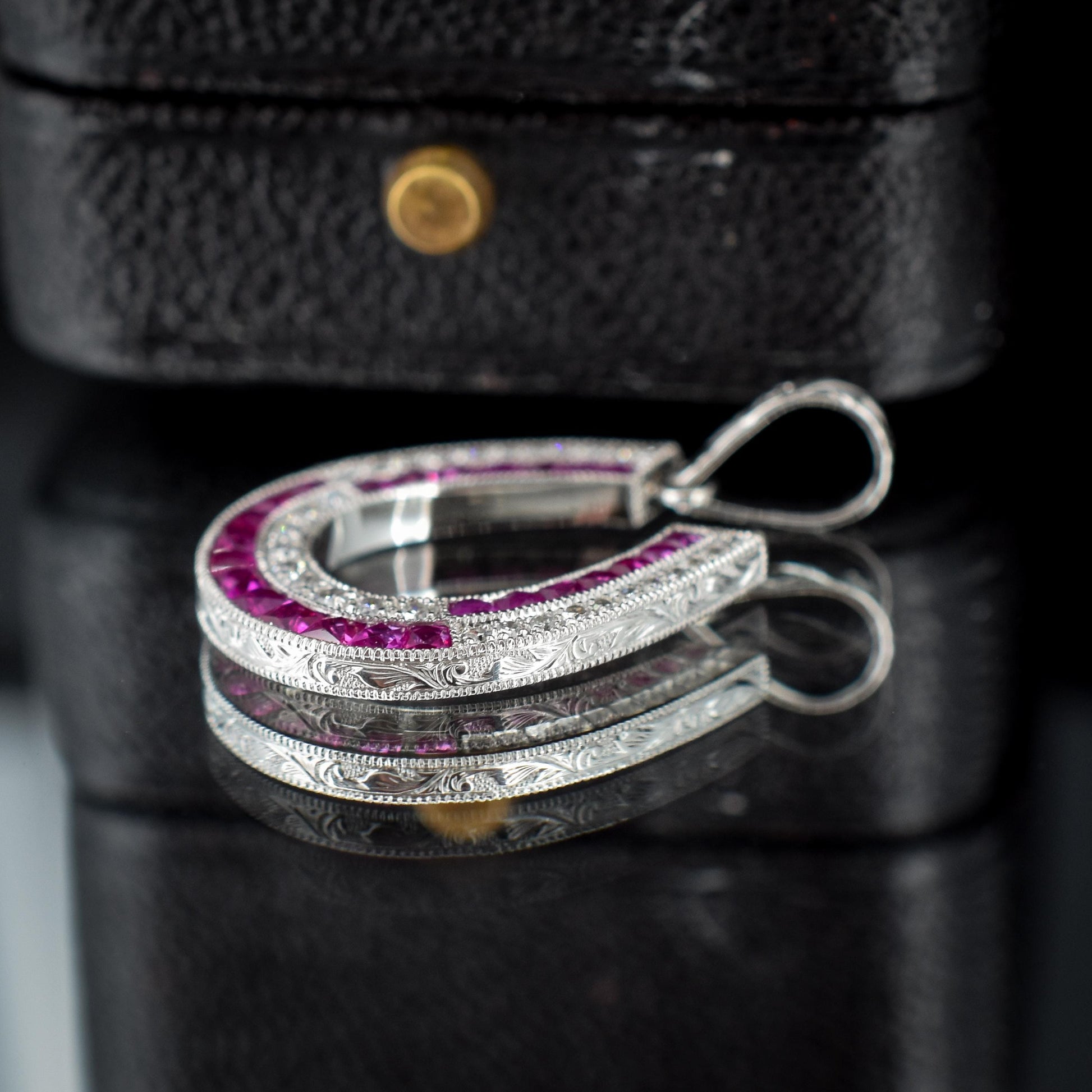 Ruby and Diamond Double Row Horseshoe Platinum Charm Pendant