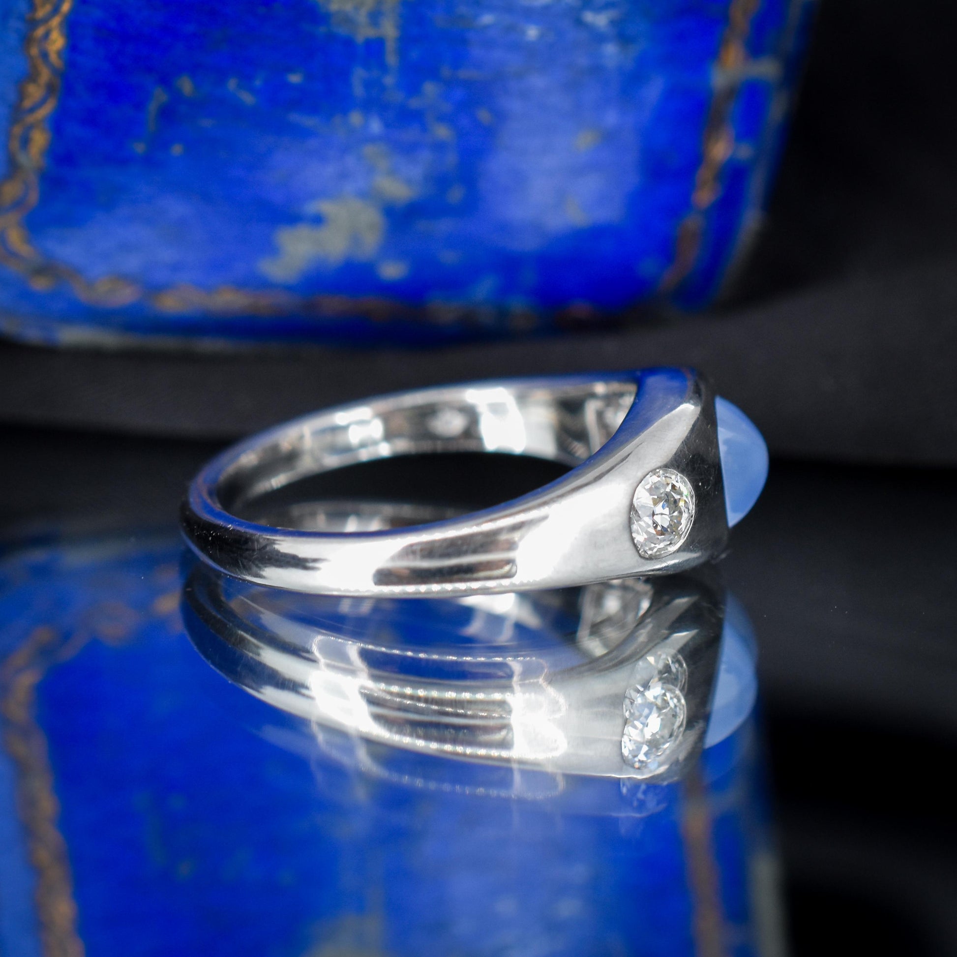 Sugarloaf Star Sapphire and Diamond Three Stone Platinum Band Ring