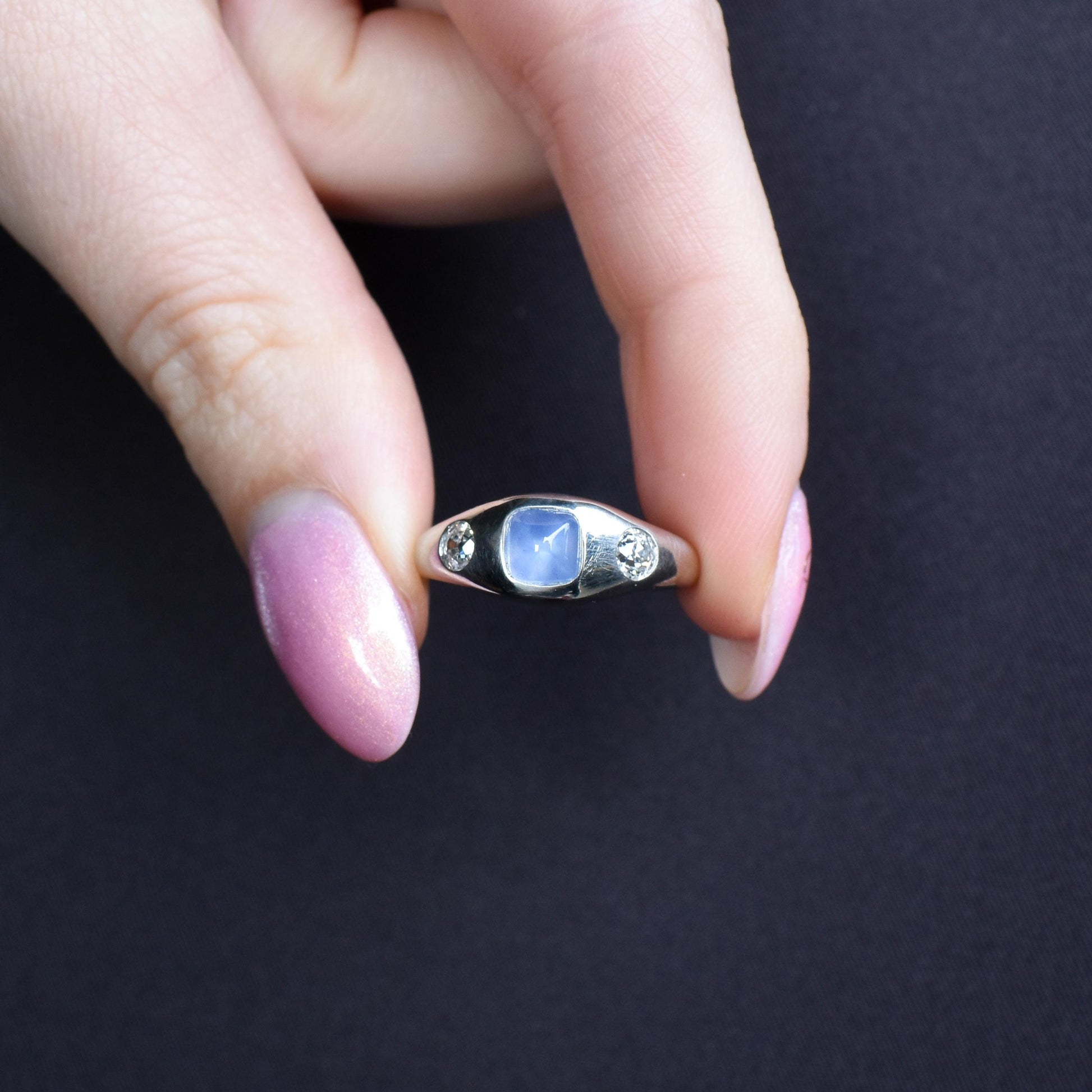 Sugarloaf Star Sapphire and Diamond Three Stone Platinum Band Ring