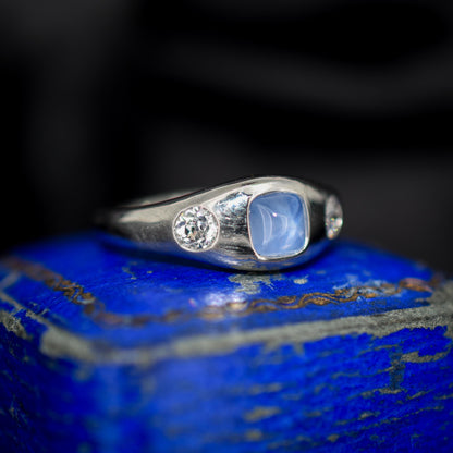 Sugarloaf Star Sapphire and Diamond Three Stone Platinum Band Ring