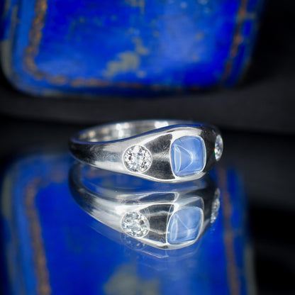 Sugarloaf Star Sapphire and Diamond Three Stone Platinum Band Ring