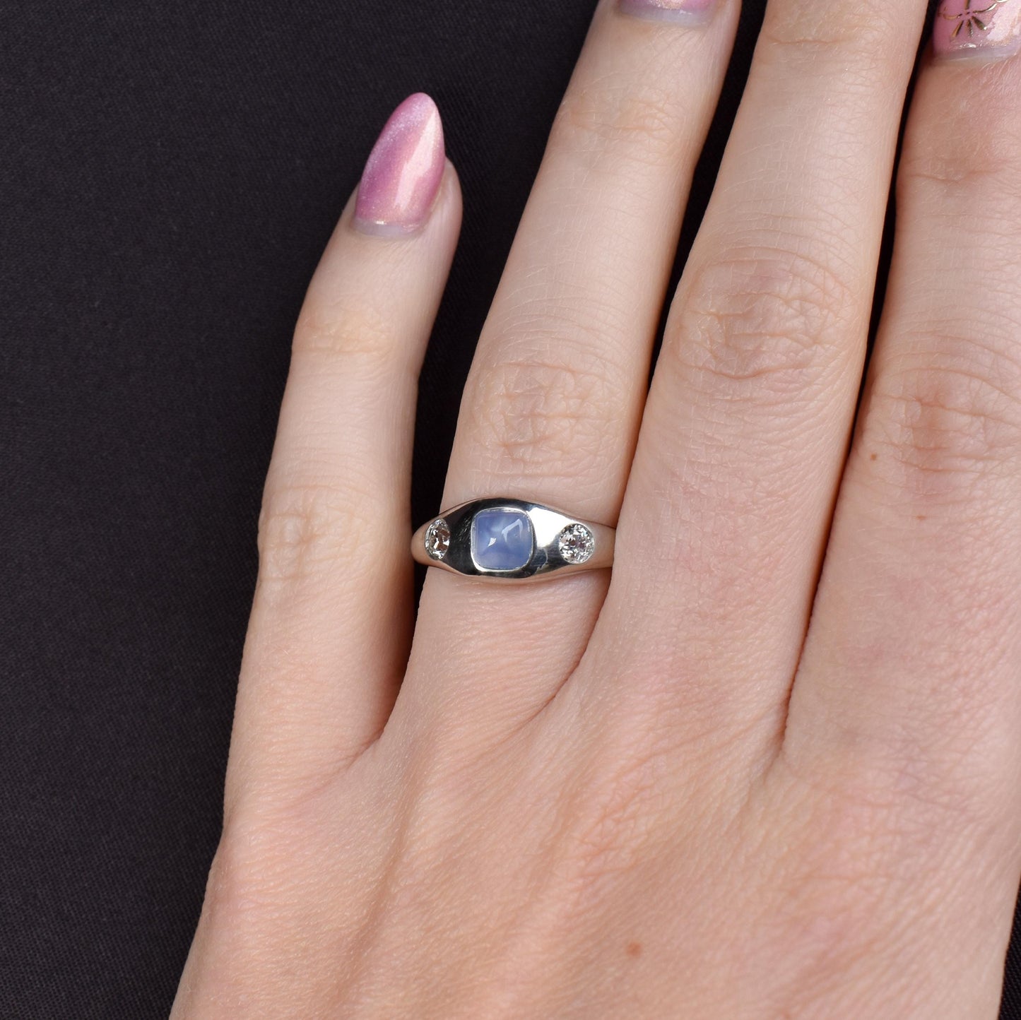 Sugarloaf Star Sapphire and Diamond Three Stone Platinum Band Ring