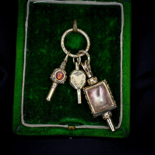 Antique Gold Cased Trio of Fobs Charms on Split Ring