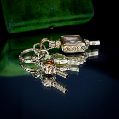 Antique Gold Cased Trio of Fobs Charms on Split Ring