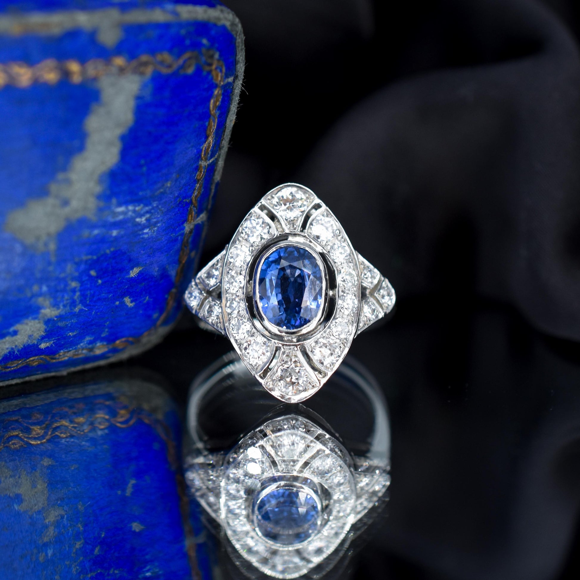 Art Deco Style Blue Sapphire and Diamond Halo Platinum Ring