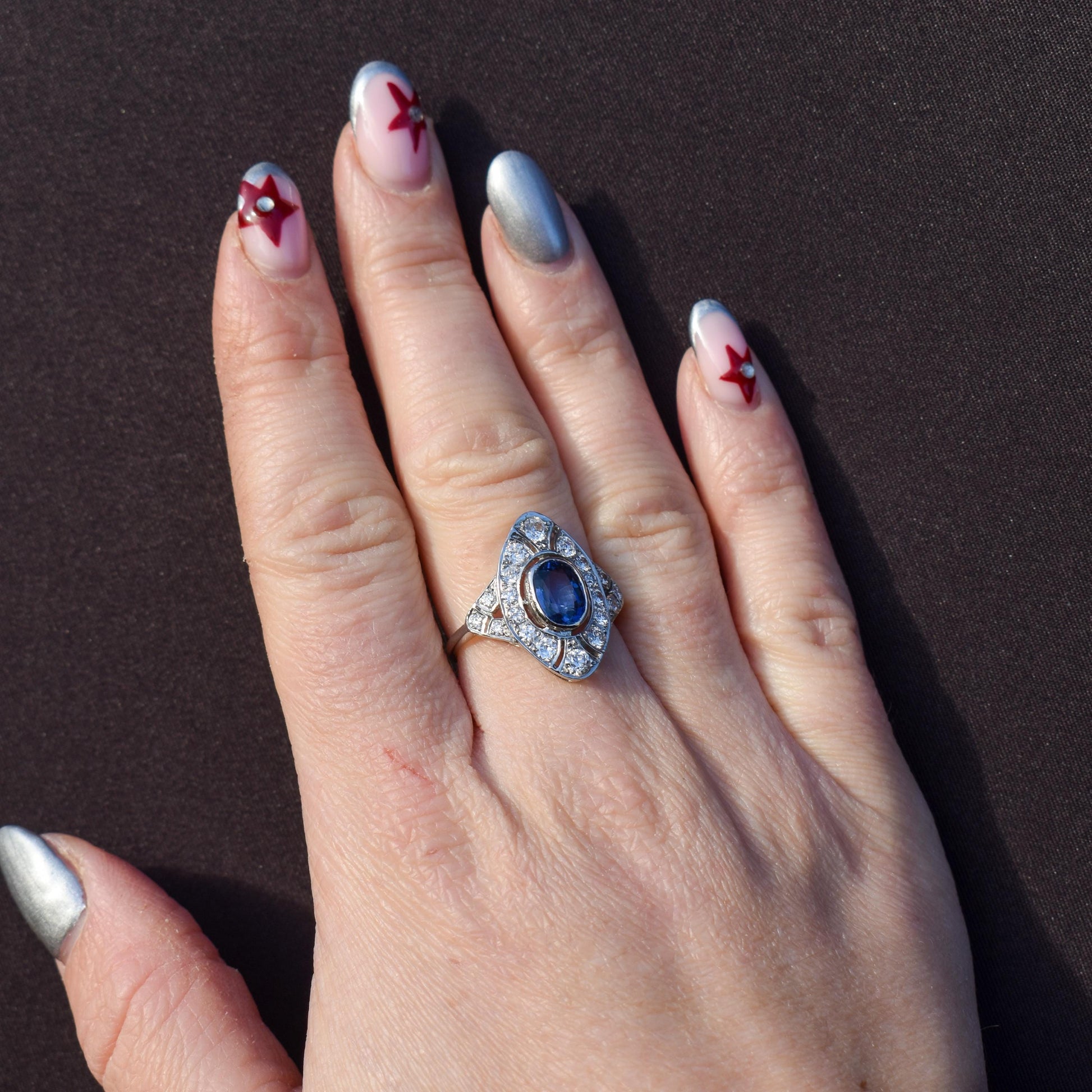 Art Deco Style Blue Sapphire and Diamond Halo Platinum Ring