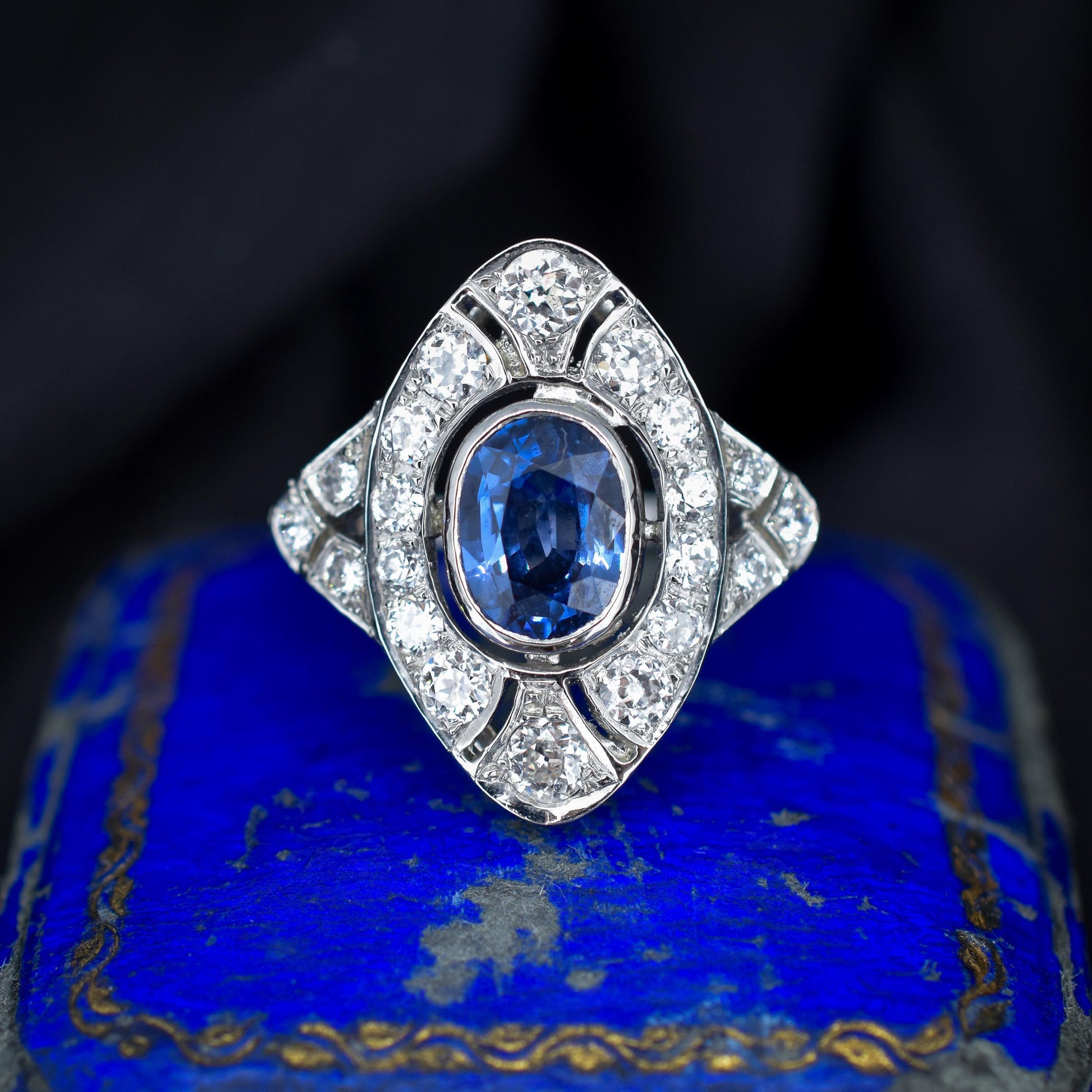 Art Deco Style Blue Sapphire and Diamond Halo Platinum Ring