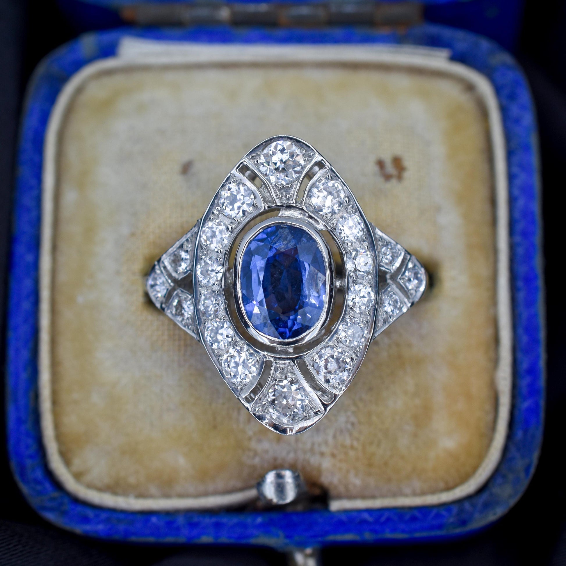 Art Deco Style Blue Sapphire and Diamond Halo Platinum Ring