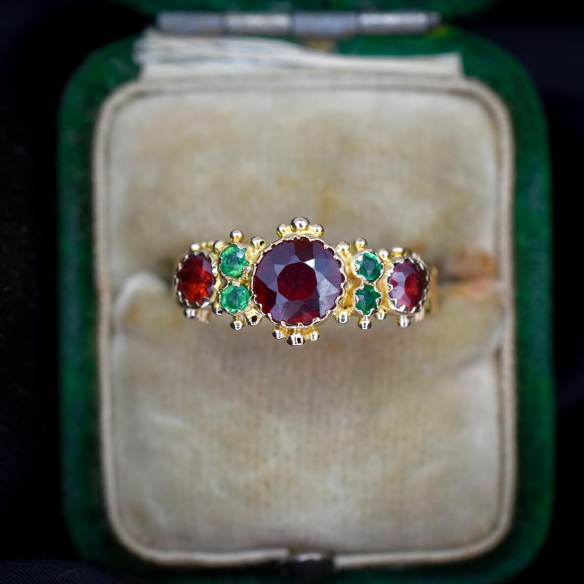 Antique Garnet and Emerald 15ct Gold Scroll Ring | Dated 1887