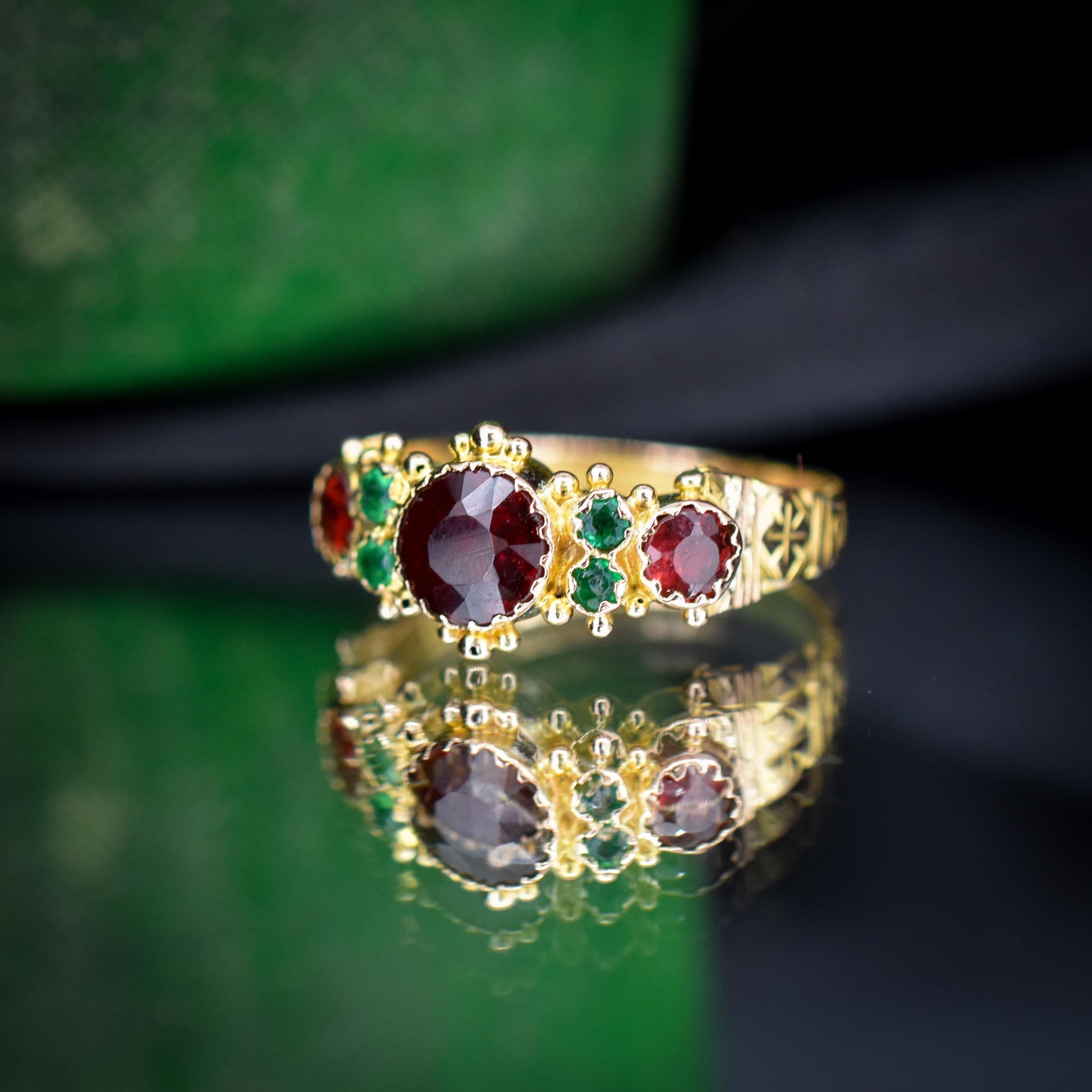 Antique Garnet and Emerald 15ct Gold Scroll Ring | Dated 1887