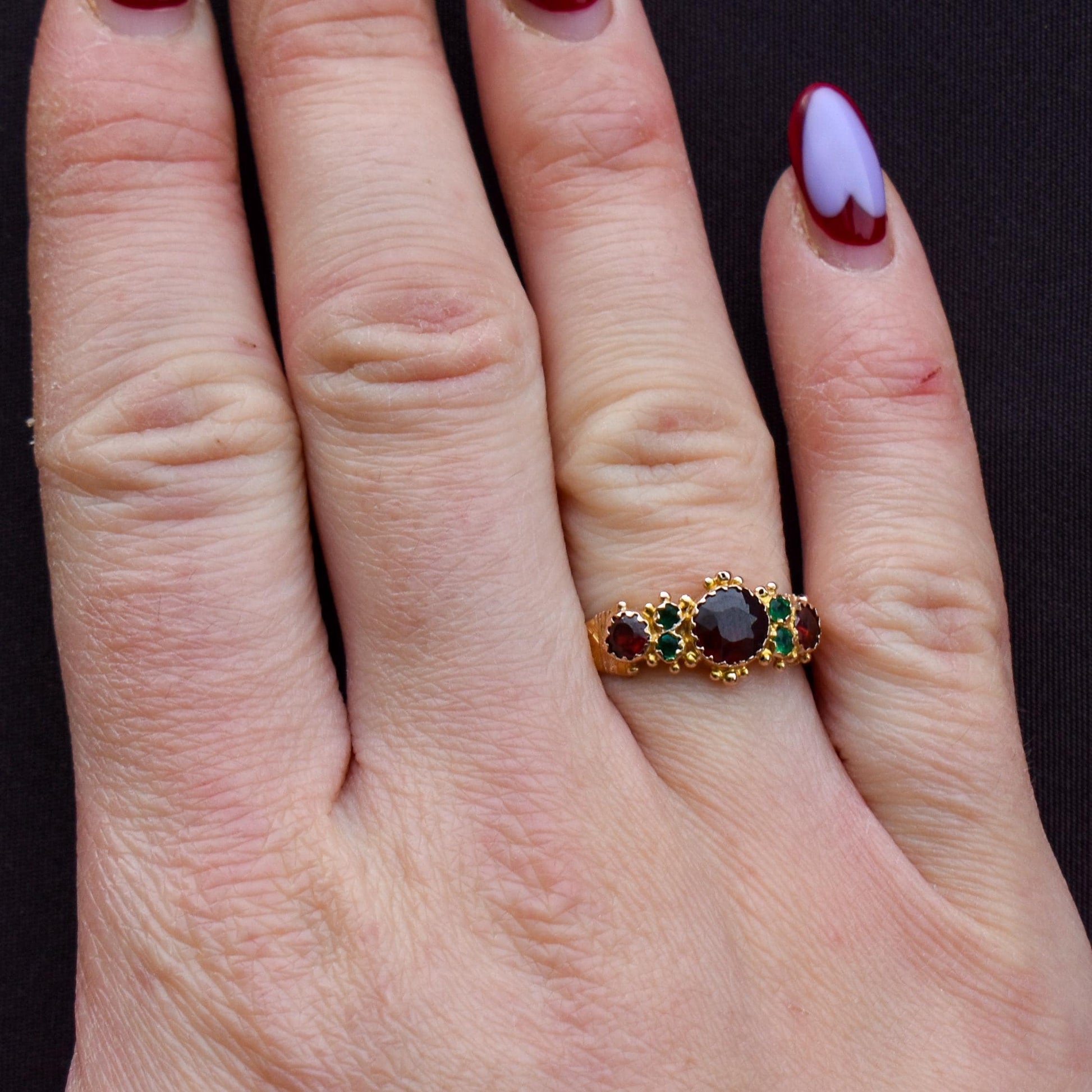 Antique Garnet and Emerald 15ct Gold Scroll Ring | Dated 1887
