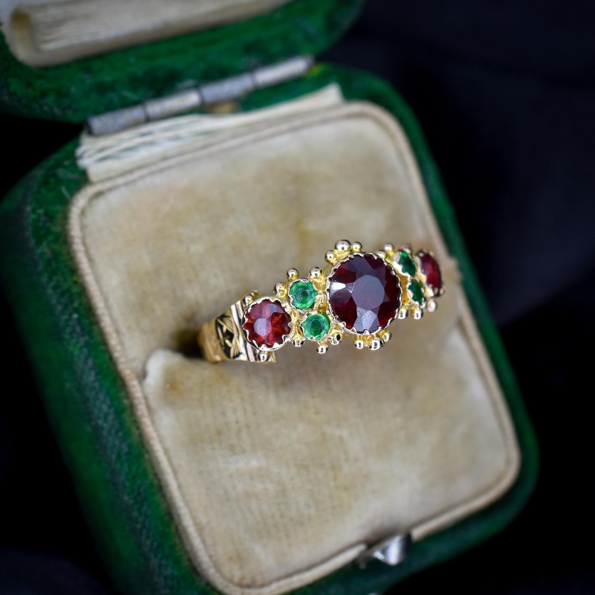 Antique Garnet and Emerald 15ct Gold Scroll Ring | Dated 1887