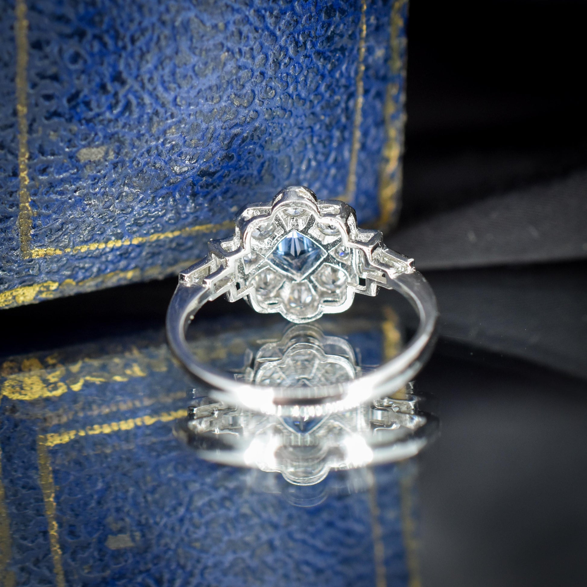 Art Deco Style Blue Sapphire and Diamond Halo Platinum Ring