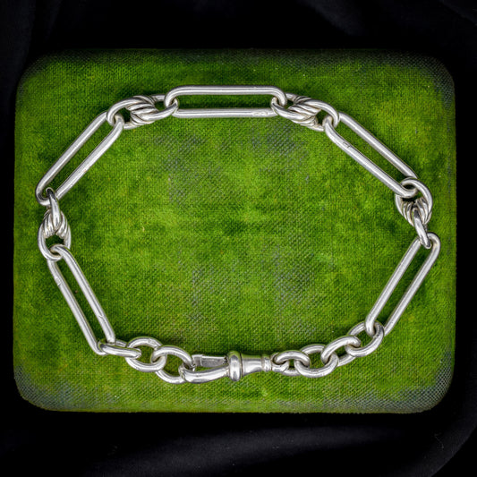 Antique Sterling Silver Trombone and Love Knot Link Bracelet with Dog Clip | 8.75"