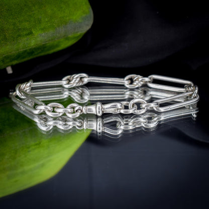 Antique Sterling Silver Trombone and Love Knot Link Bracelet with Dog Clip | 8.75"