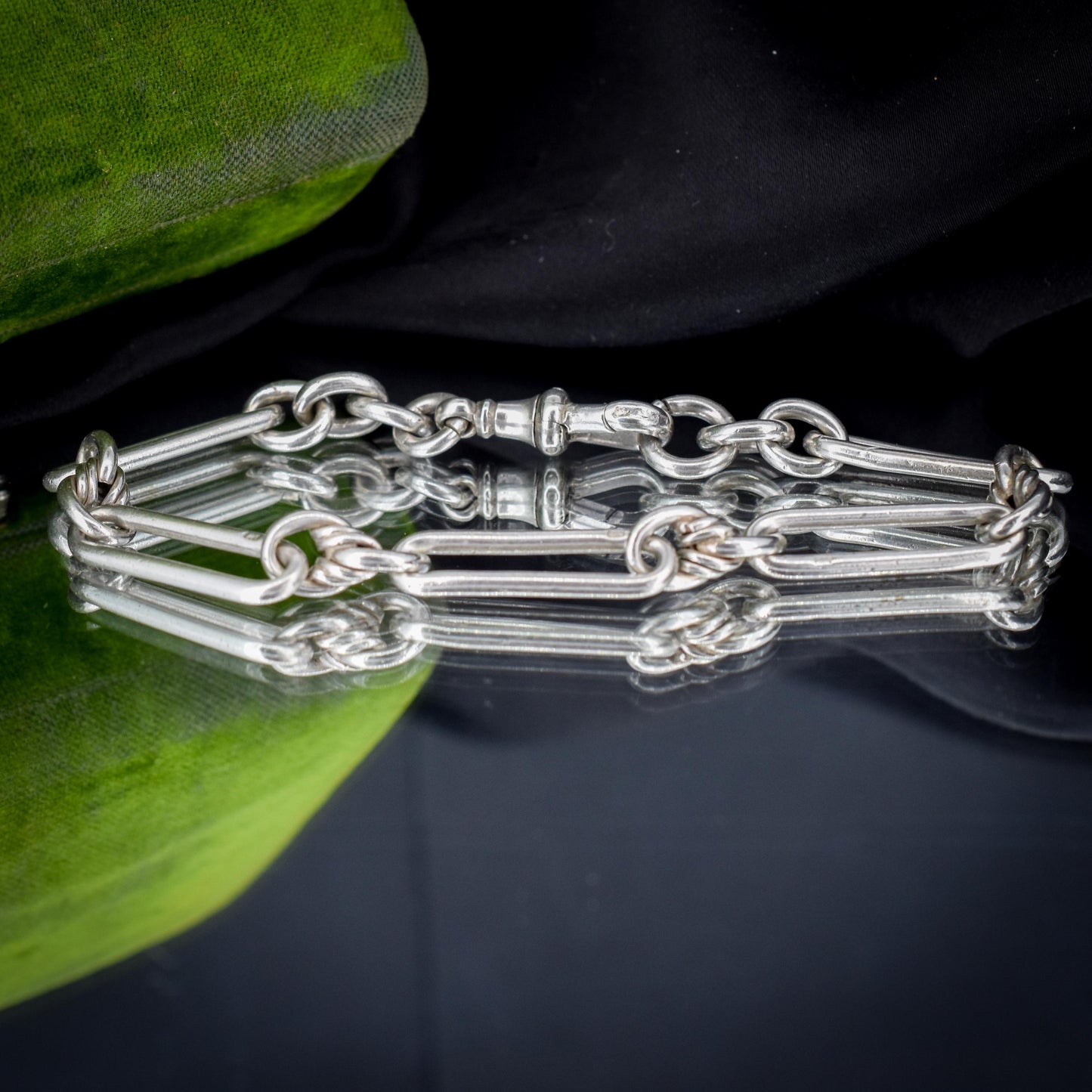 Antique Sterling Silver Trombone and Love Knot Link Bracelet with Dog Clip | 8.75"