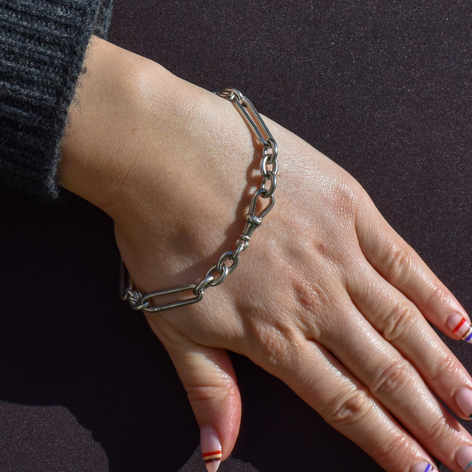 Antique Sterling Silver Trombone and Love Knot Link Bracelet with Dog Clip | 8.75"