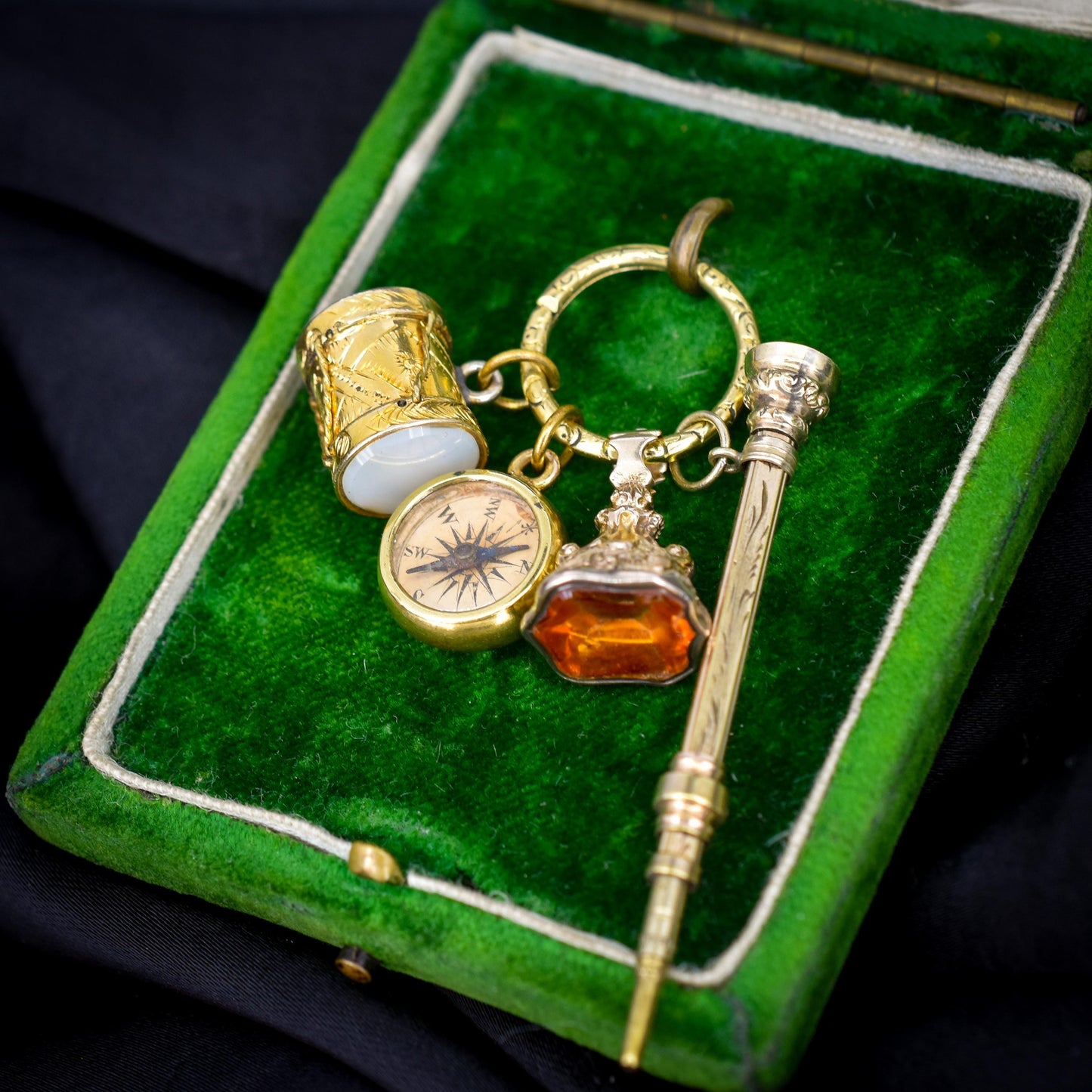 Antique Charms on an Engraved Split Ring
