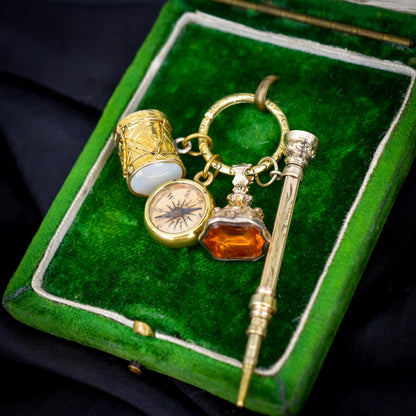 Antique Charms on an Engraved Split Ring