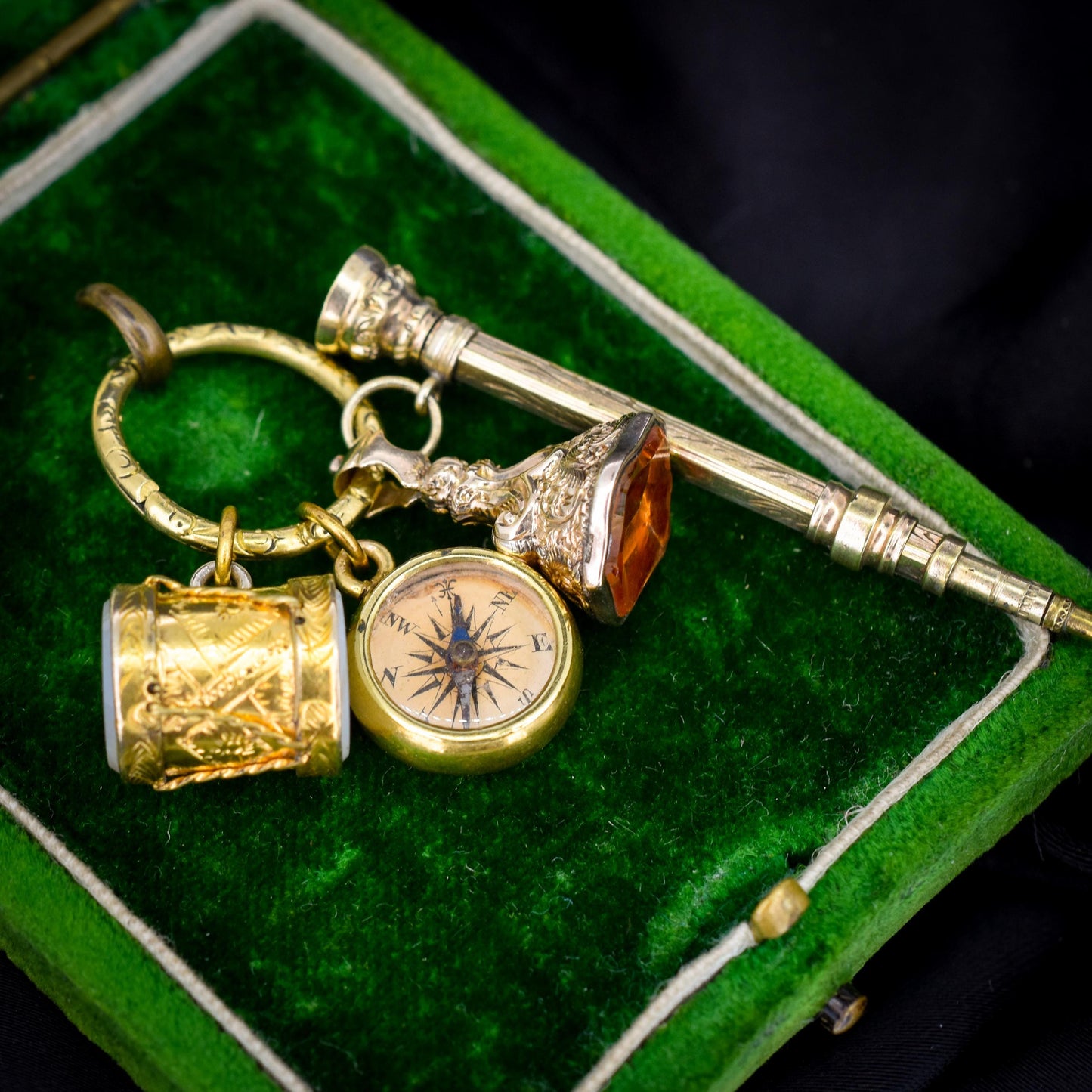 Antique Charms on an Engraved Split Ring
