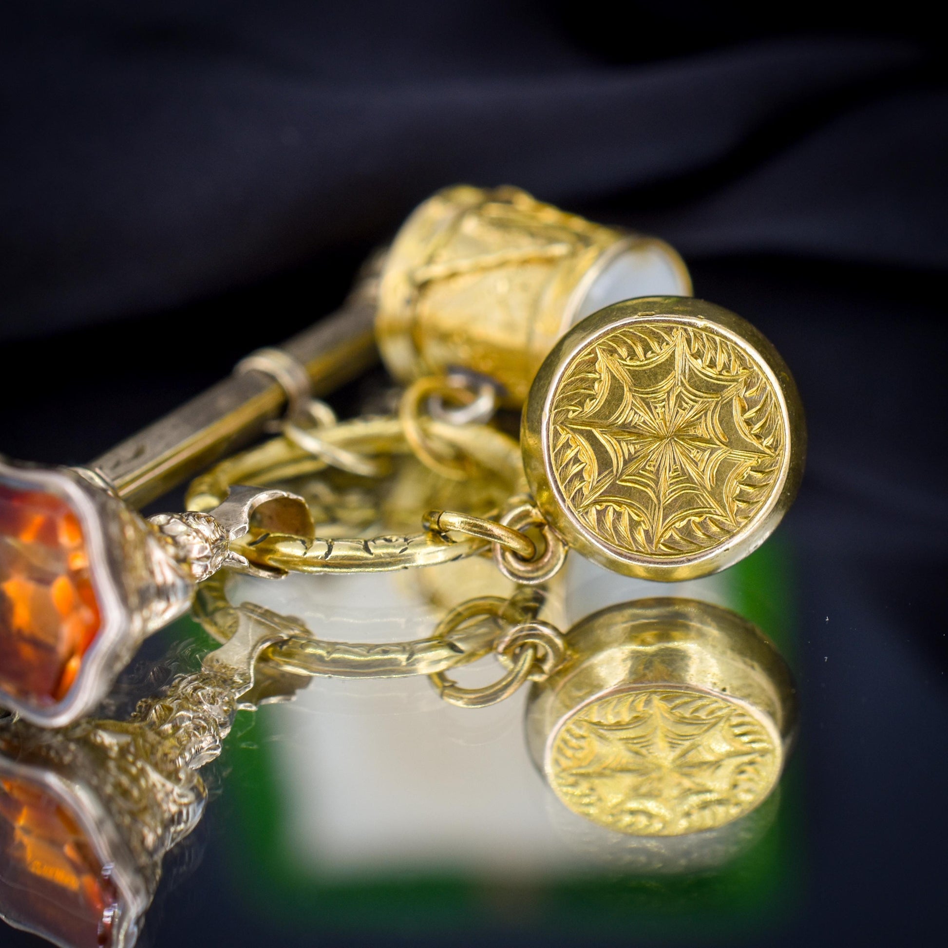Antique Charms on an Engraved Split Ring