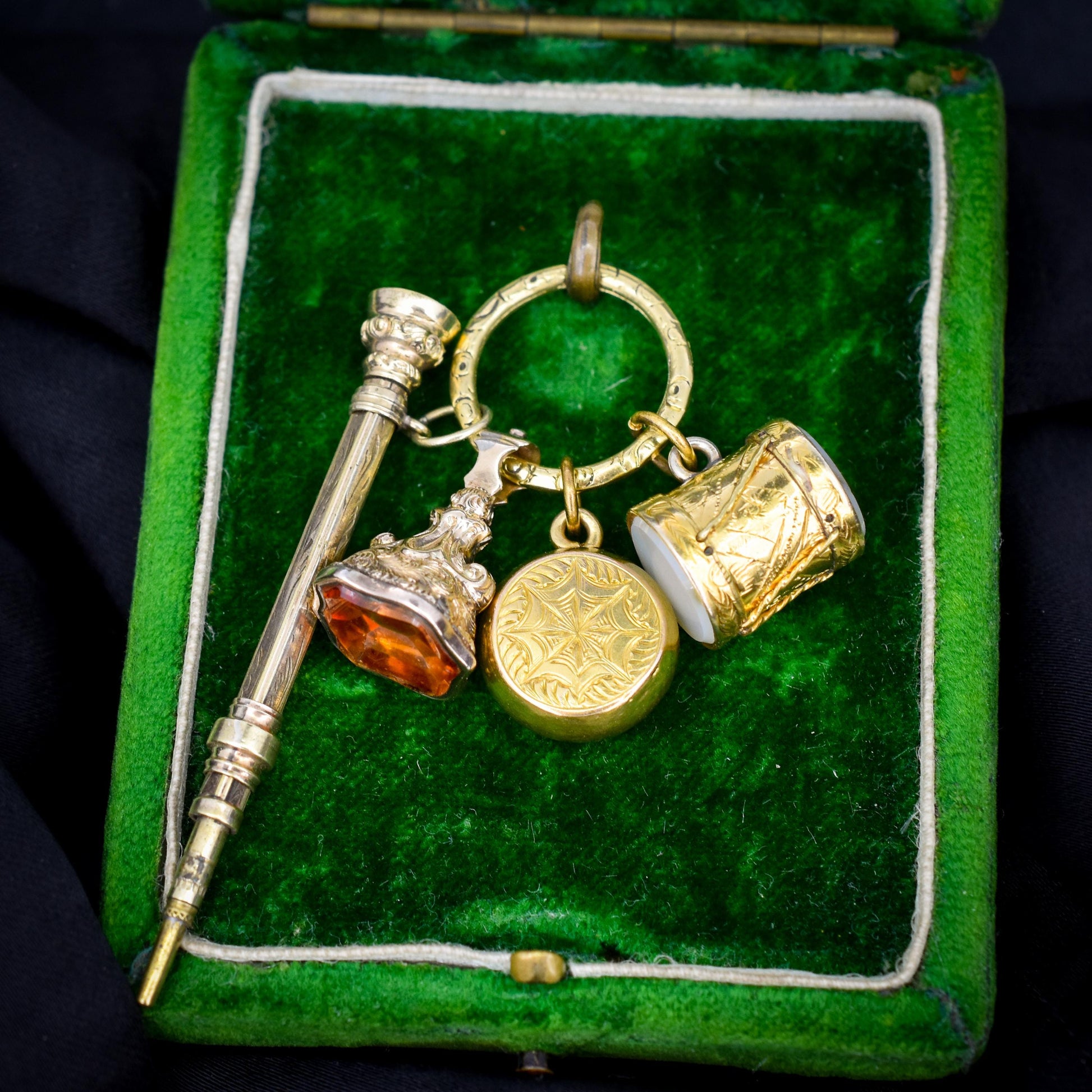 Antique Charms on an Engraved Split Ring
