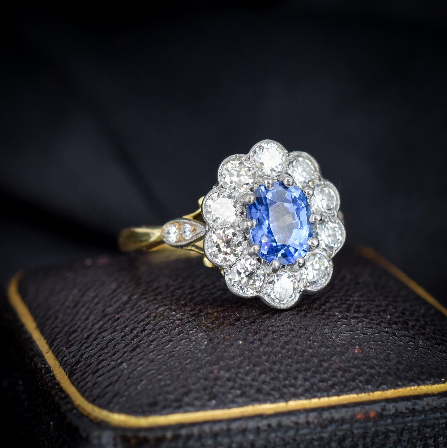 Edwardian Style 0.83ct Blue Sapphire and Diamond Oval Cluster Halo Ring
