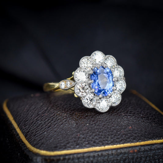Edwardian Style 0.83ct Blue Sapphire and Diamond Oval Cluster Halo Ring