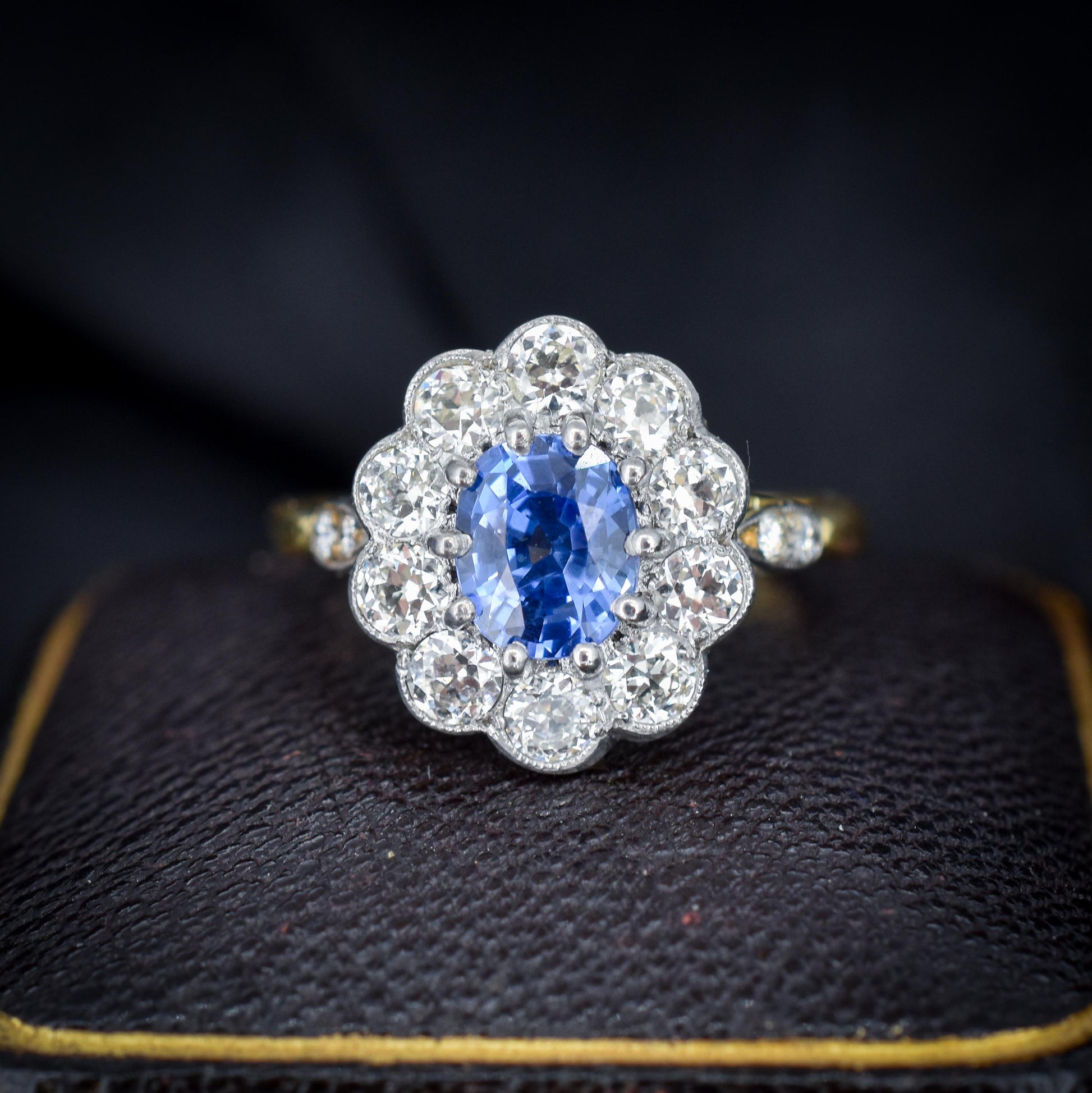 Edwardian Style 0.83ct Blue Sapphire and Diamond Oval Cluster Halo Ring