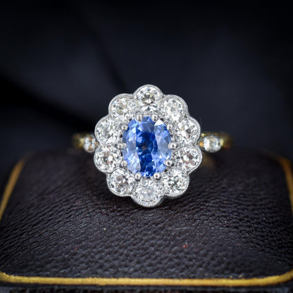 Edwardian Style 0.83ct Blue Sapphire and Diamond Oval Cluster Halo Ring