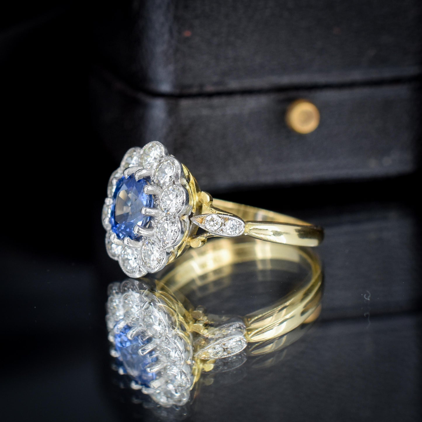 Edwardian Style 0.83ct Blue Sapphire and Diamond Oval Cluster Halo Ring