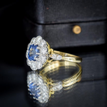 Edwardian Style 0.83ct Blue Sapphire and Diamond Oval Cluster Halo Ring