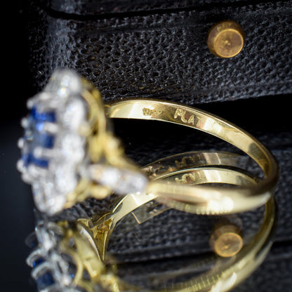 Edwardian Style 0.83ct Blue Sapphire and Diamond Oval Cluster Halo Ring
