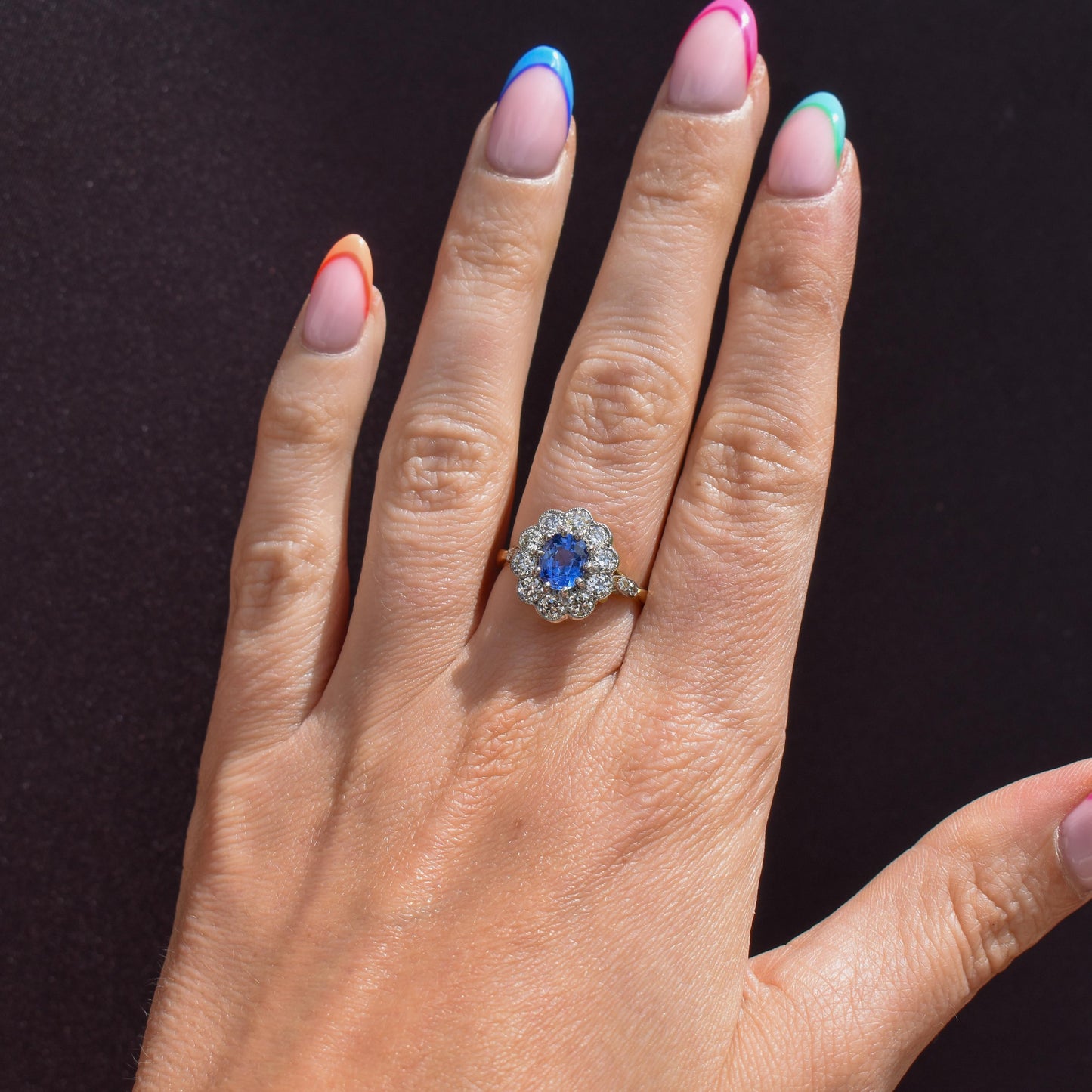 Edwardian Style 0.83ct Blue Sapphire and Diamond Oval Cluster Halo Ring