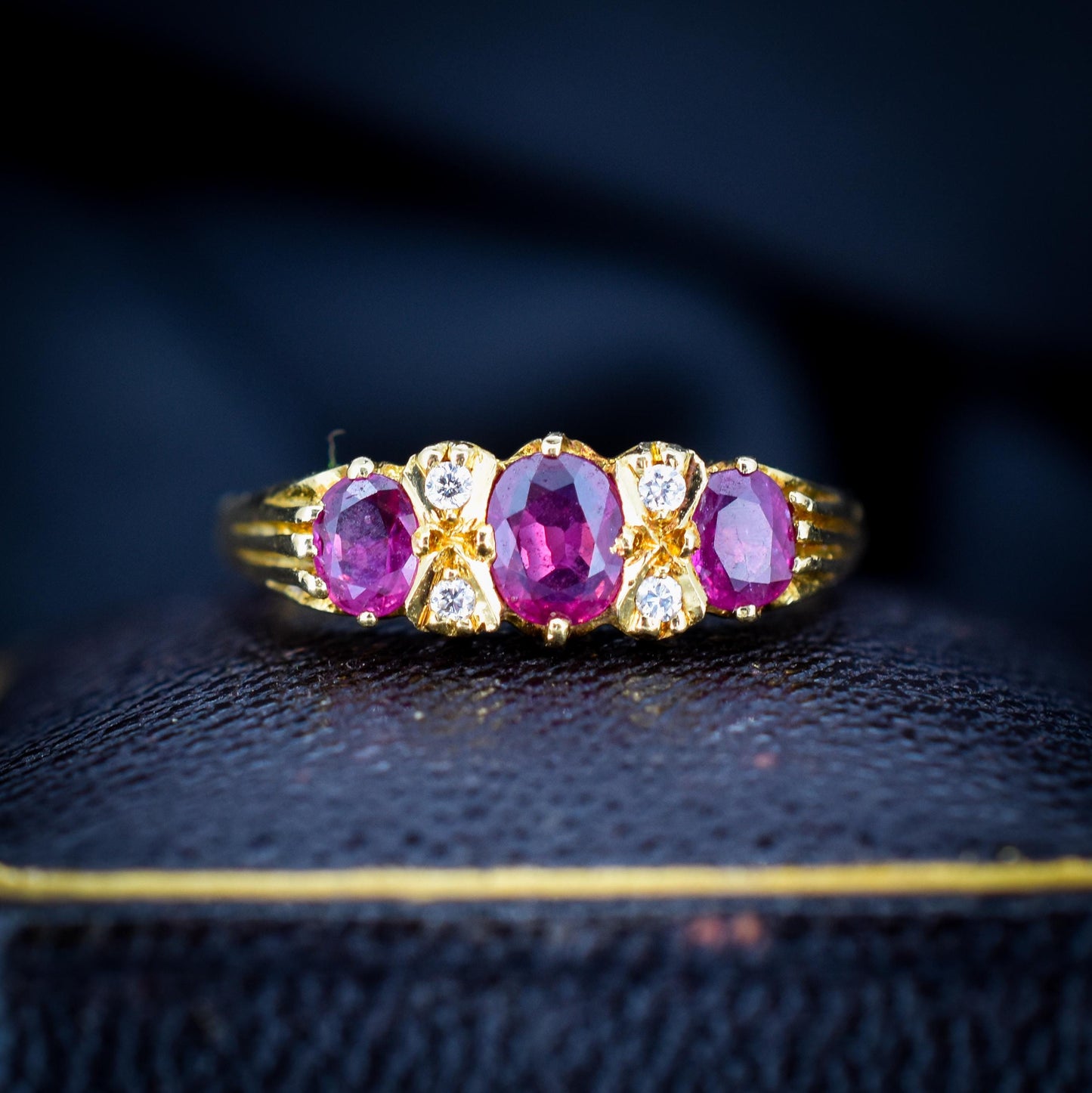 Vintage Ruby and Diamond Three-Stone 18ct Yellow Gold Scroll Ring