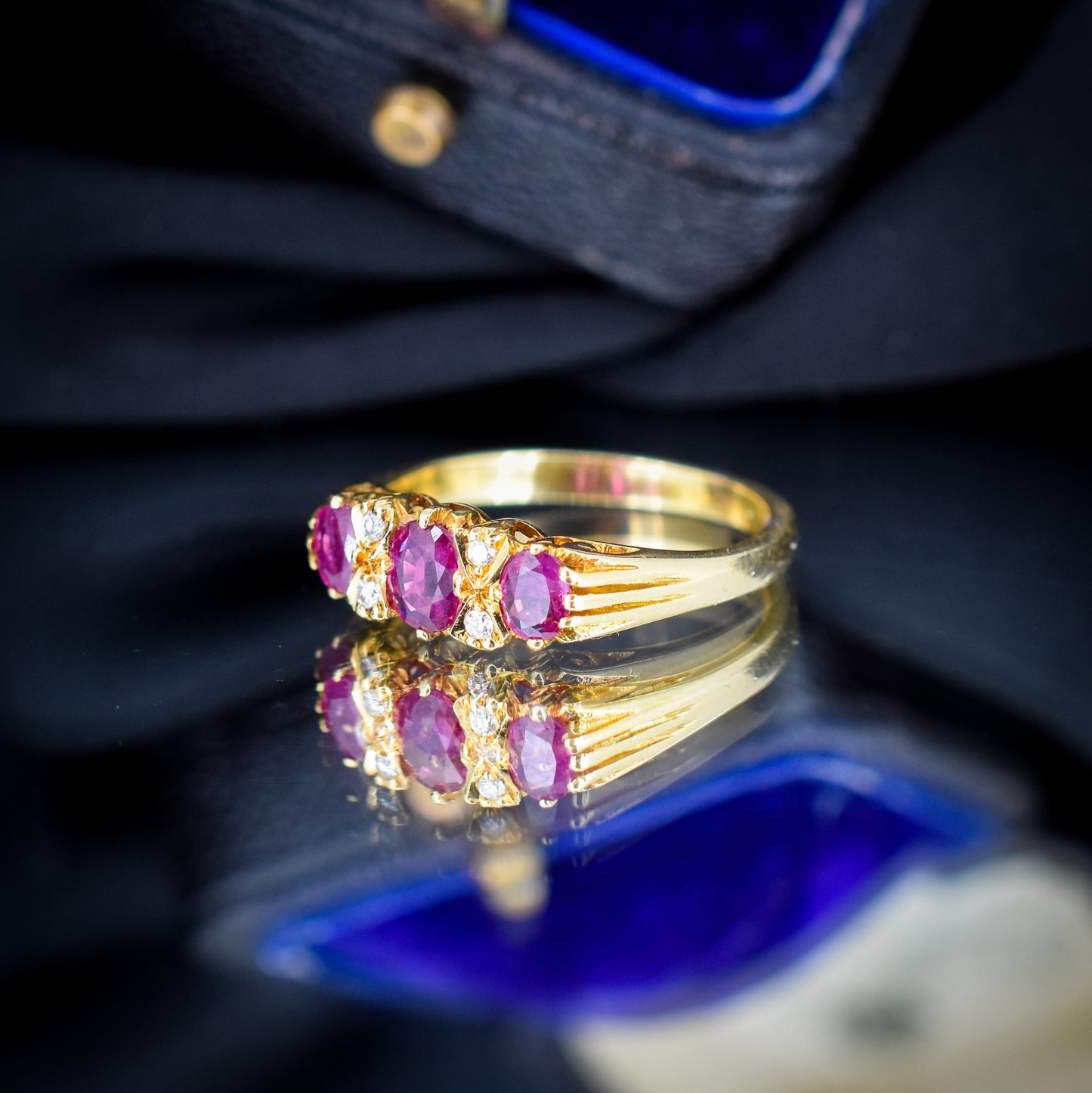 Vintage Ruby and Diamond Three-Stone 18ct Yellow Gold Scroll Ring