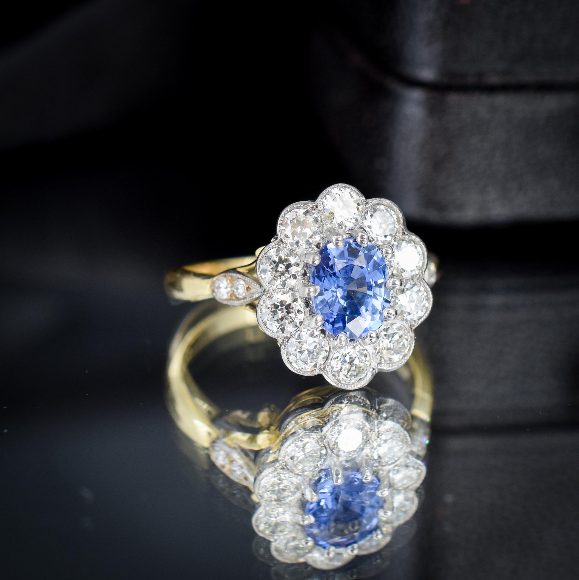 Edwardian Style 0.83ct Blue Sapphire and Diamond Oval Cluster Halo Ring