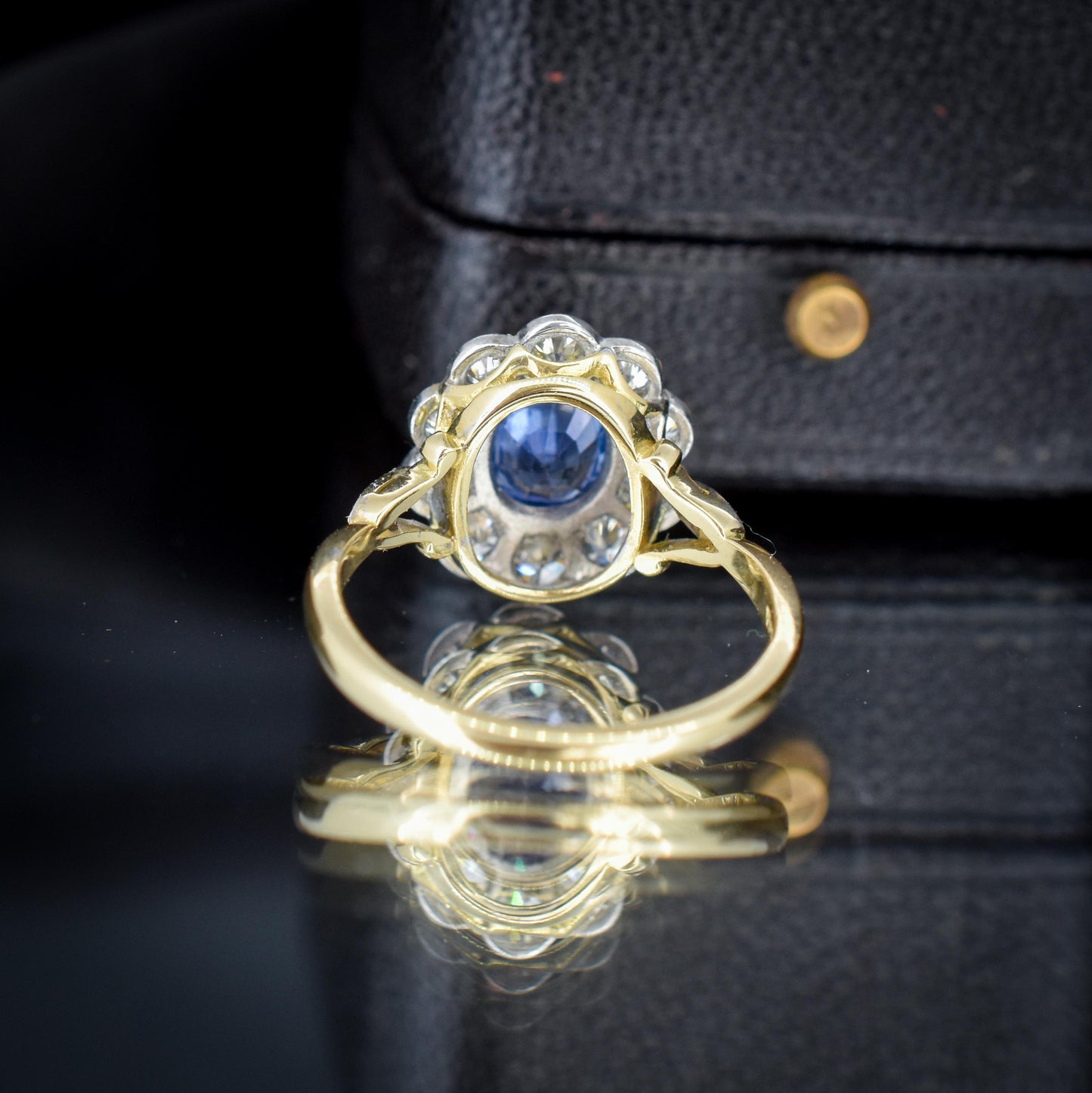 Edwardian Style 0.83ct Blue Sapphire and Diamond Oval Cluster Halo Ring