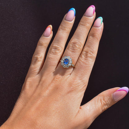 Edwardian Style 0.83ct Blue Sapphire and Diamond Oval Cluster Halo Ring