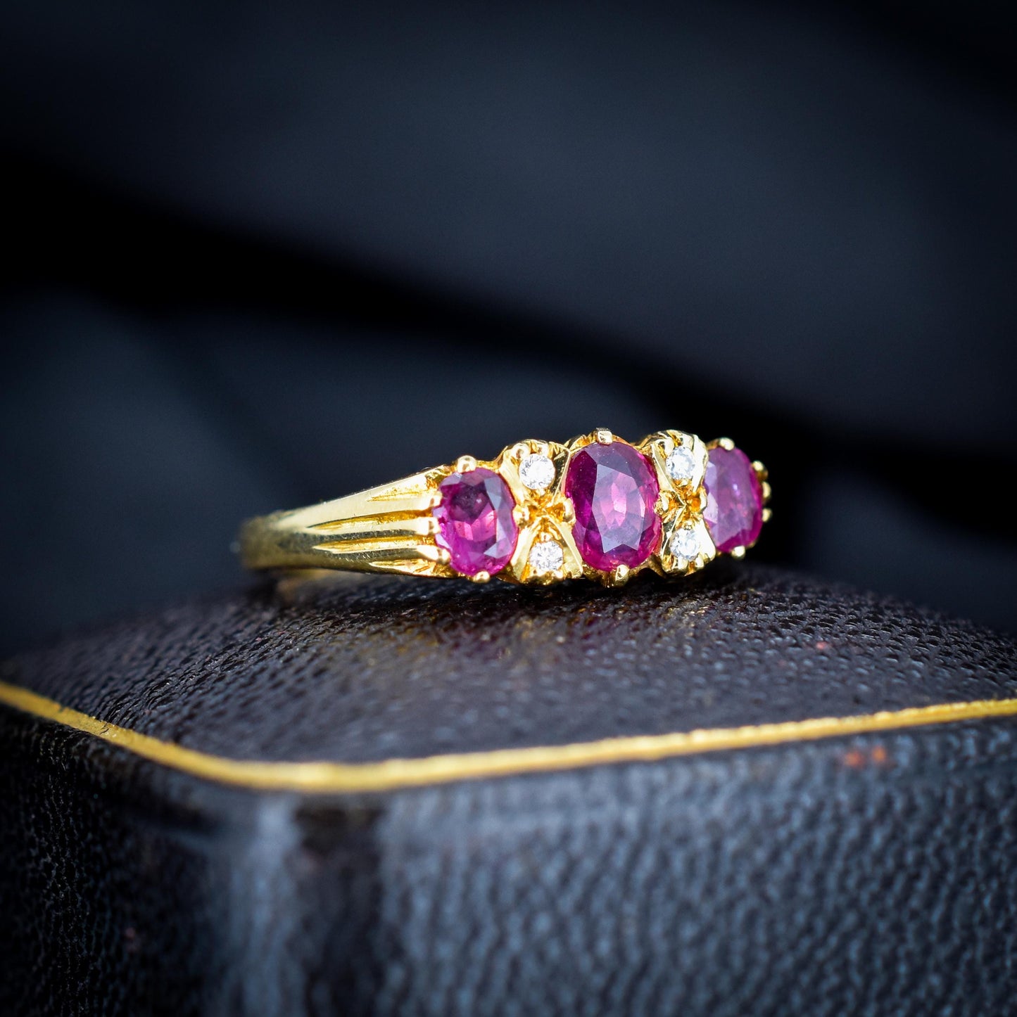 Vintage Ruby and Diamond Three-Stone 18ct Yellow Gold Scroll Ring