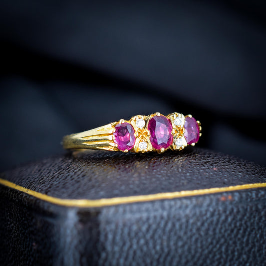 Vintage Ruby and Diamond Three-Stone 18ct Yellow Gold Scroll Ring