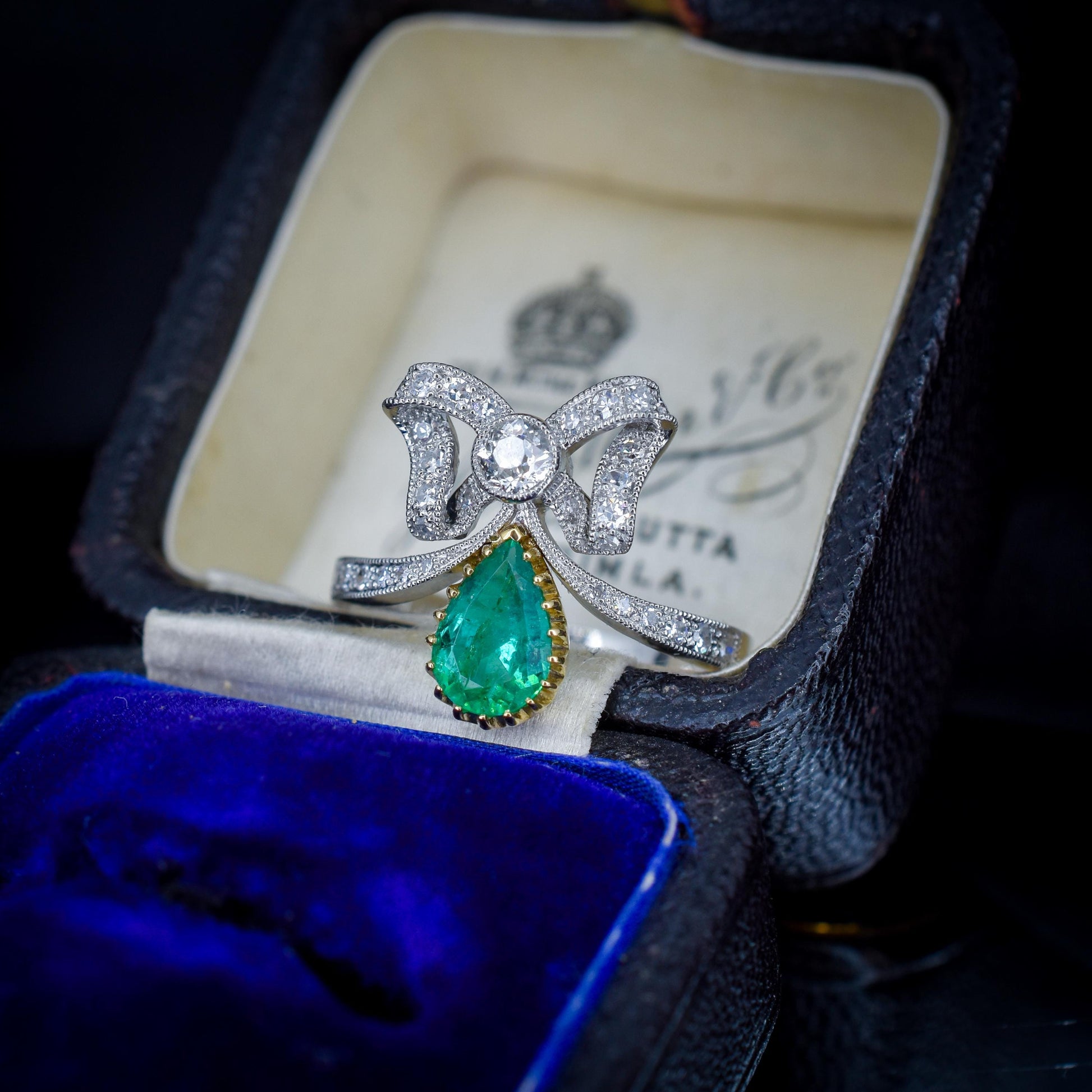 Pear Cut Emerald and Diamond Bow Platinum Tiara Ring | Engagement | Belle Epoque Style