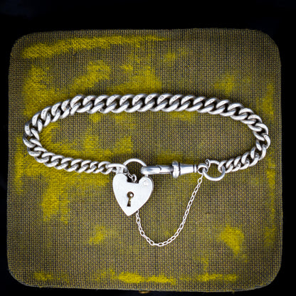 Antique Graduated Curb Sterling Silver Bracelet with Dog Clip and Heart Padlock | 7"