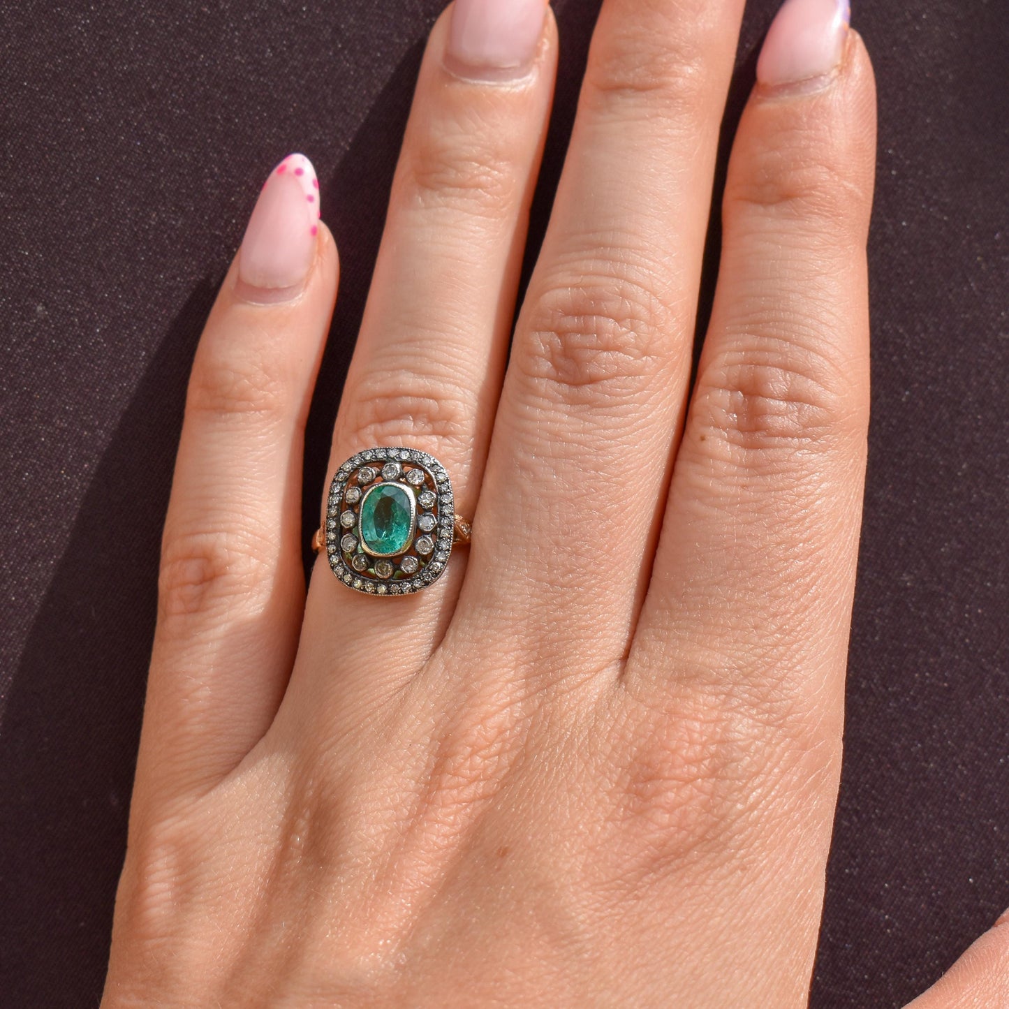 Emerald and Diamond Oval Cluster Halo Yellow Gold and Silver Ring | Antique Style