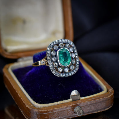 Emerald and Diamond Oval Cluster Halo Yellow Gold and Silver Ring | Antique Style