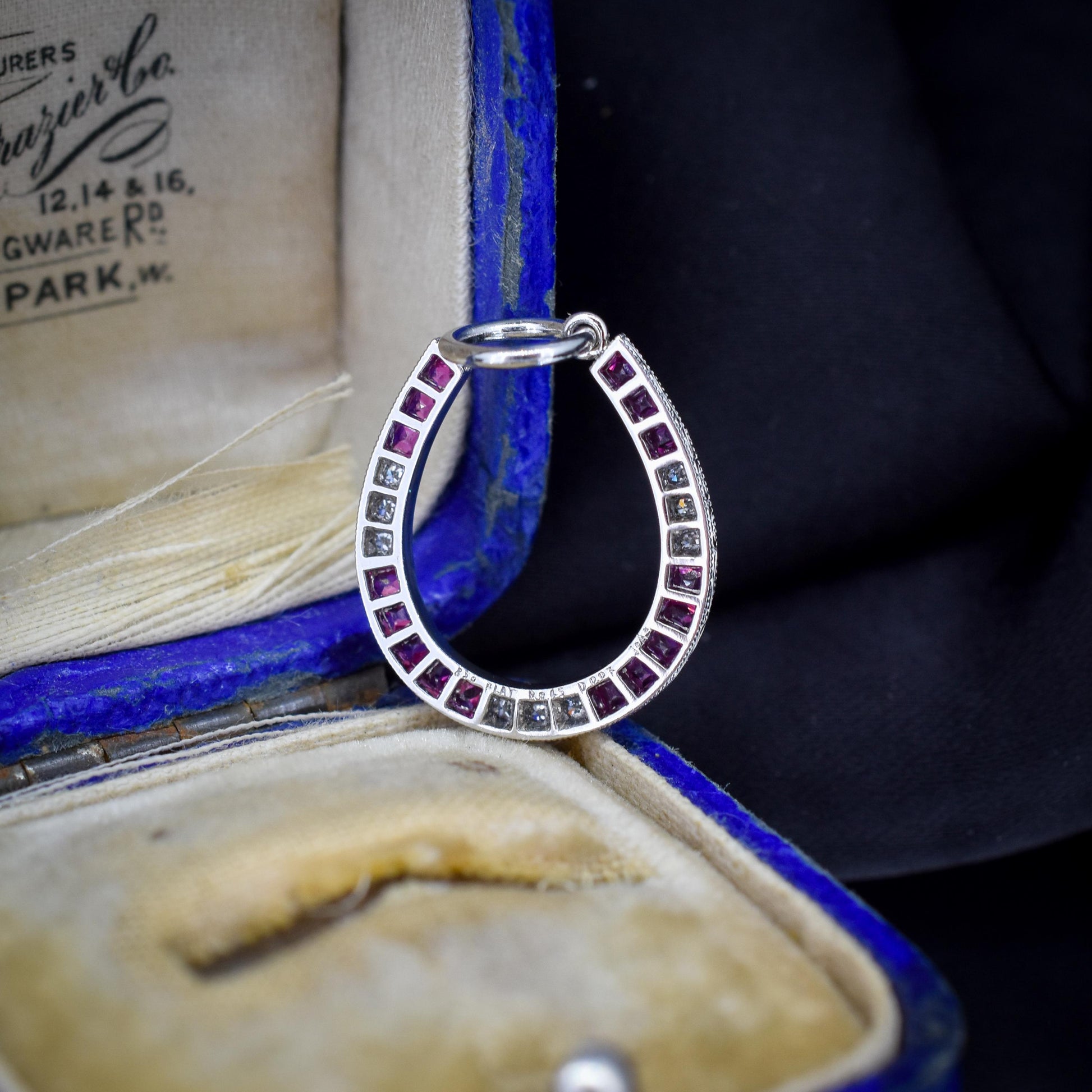 French Cut Ruby and Diamond Horseshoe Platinum Charm Pendant