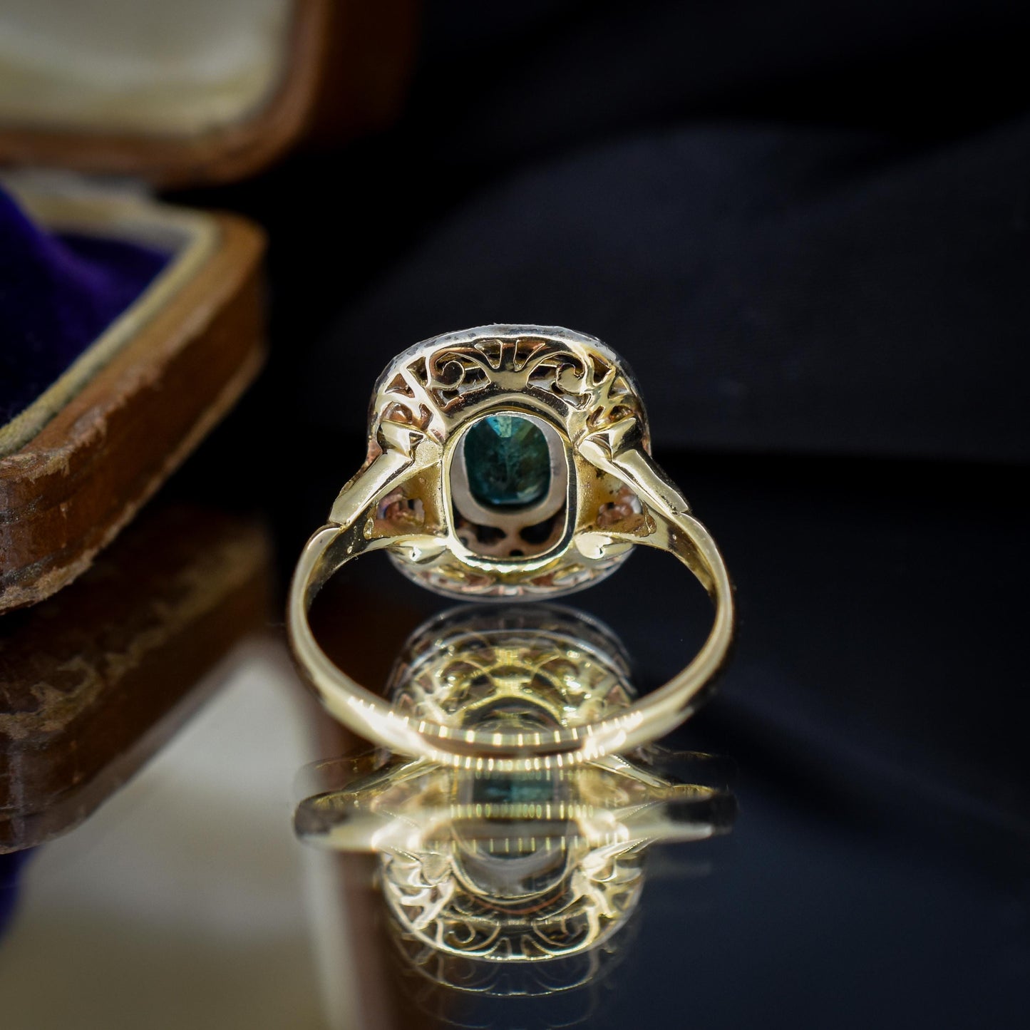 Emerald and Diamond Oval Cluster Halo Yellow Gold and Silver Ring | Antique Style